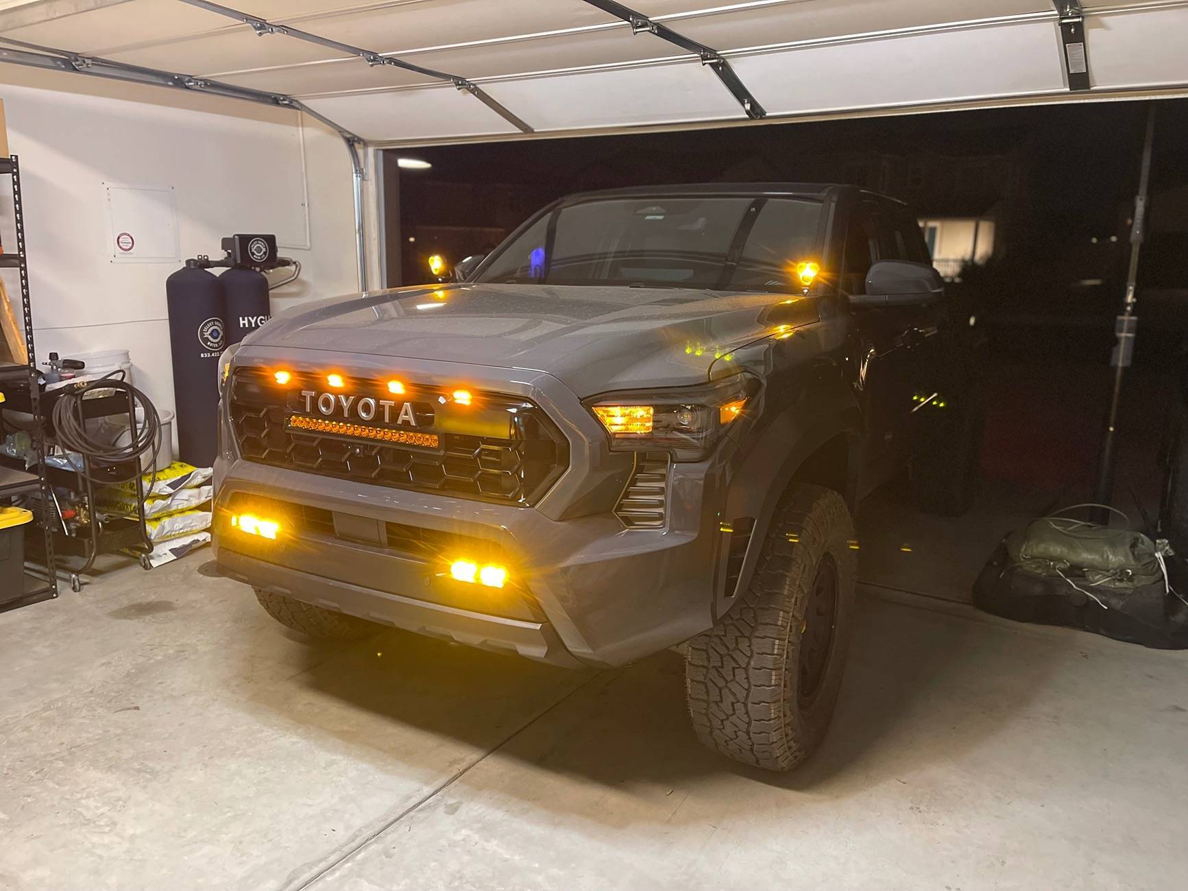 2025 Toyota 4runner Heretic light bar, Baja fog lights & Raptor aftermarket lights installed in TRD Pro grill img_6013-jpe