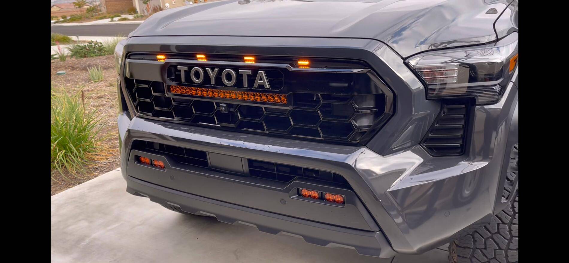 2025 Toyota 4runner Heretic light bar, Baja fog lights & Raptor aftermarket lights installed in TRD Pro grill img_6039-