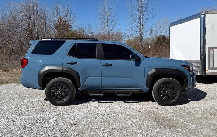 Idle hands = debadged, painted Toyota emblem, tints